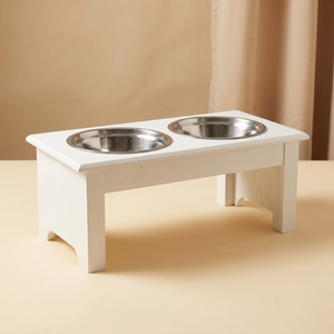 White elevated dog feeder with two stainless steel bowls for cats and dogs