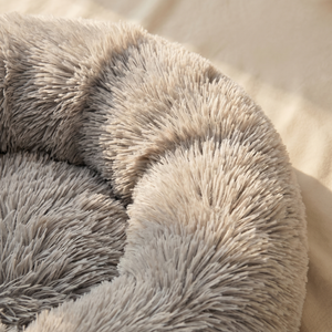 Ultra-soft plush pet bed with cozy, fluffy texture for cats and dogs