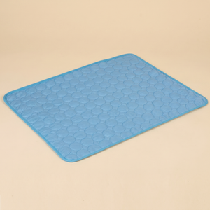 Light blue quilted pet cooling mat with circular pattern for cats and dogs