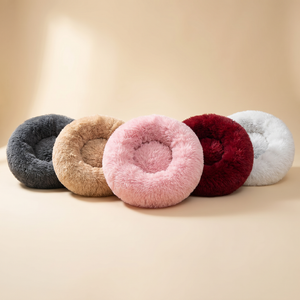 Fluffy donut pet beds in gray, tan, pink, red, and white for cozy cat & dog comfort